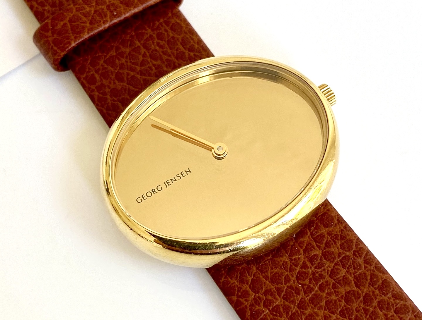 Discover the exquisite Georg Jensen Torun 18K Gold Watch, a masterpiece of Danish design that combines luxury and functionality. Perfect for any occasion, this elegant timepiece offers unmatched style and precision. Shop now to own a piece of innovative craftsmanship.